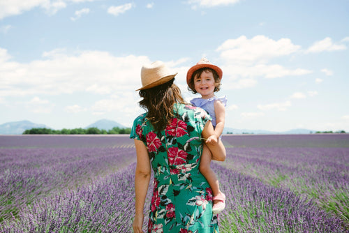 mum-in-lavendar-field-with-toddler-in-her-arms - Mustela Australia - 1