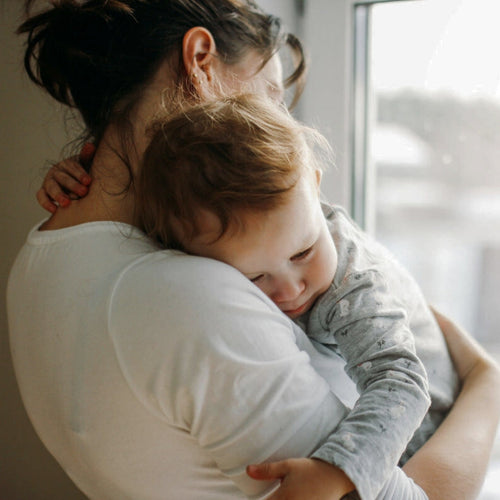 baby-not-feeling-well-in-mum-arms - Mustela Australia - 1