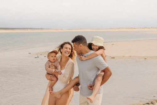 happy-family-at-the-beach - Mustela Australia - 1