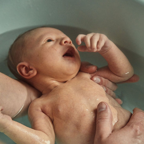 newborn-having-a-bath - Mustela Australia - 1